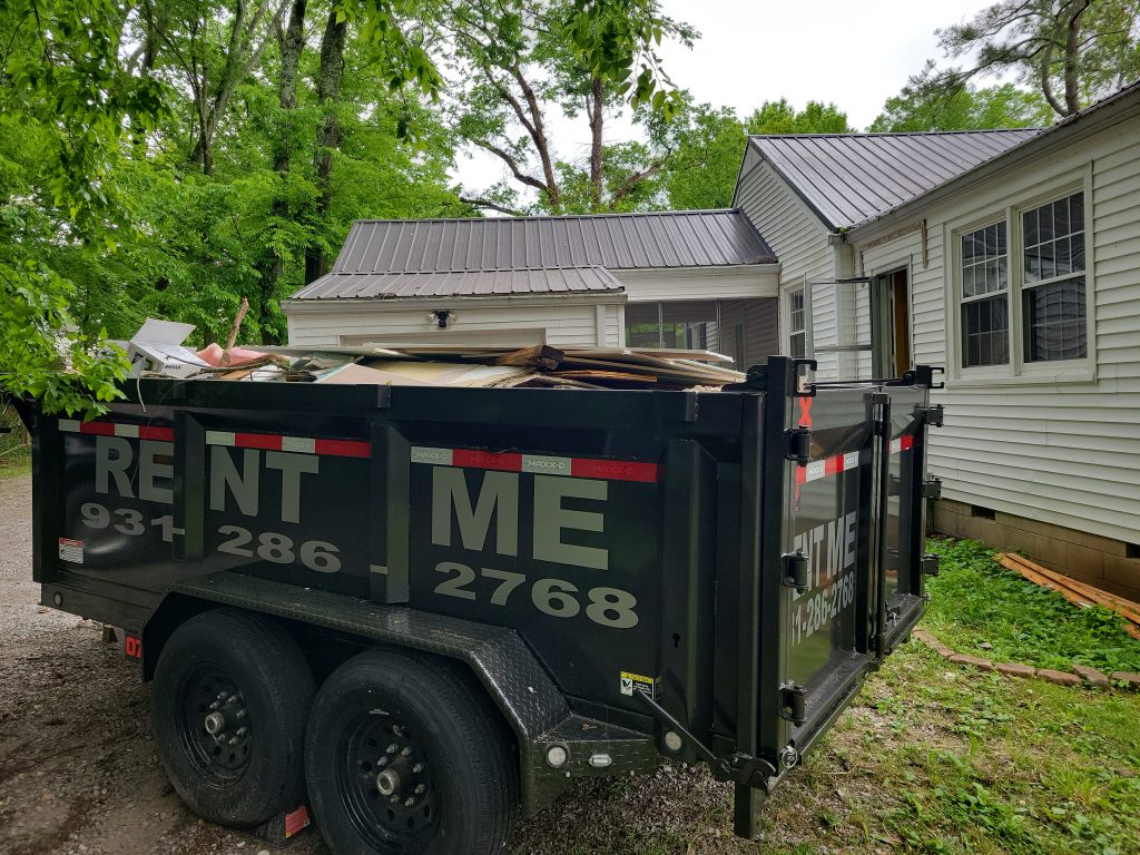 Dumpster Rental Columbia TN parked on a job site